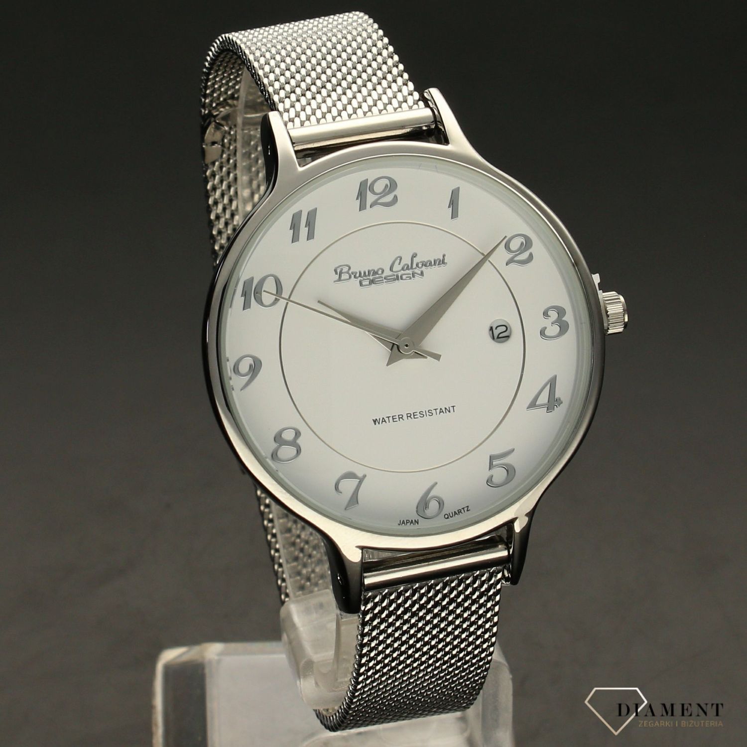 Zegarek damski BRUNO CALVANI BC3097 srebrny. Zegarek damski zachowany w klasycznym srebrnej kolorystyce z piękną białą tarczą. Tarcza zegarka ozdobiona srebrnymi cyframi arabskimi i wskazówkami. I (2).jpg